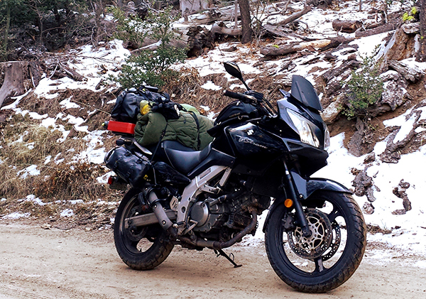 Susuki Vstrom 650 in full ADV mode with side/rear racks, Wolfman bags, Rotopax, and Rok Straps PMRacks PMR